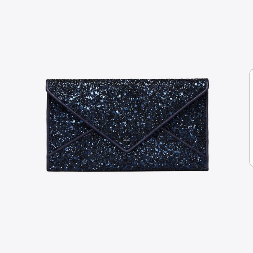 Like new blue Tory Burch glitter clutch